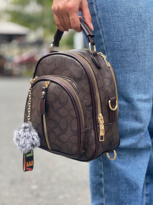 Manos Libres y Morral Bruna