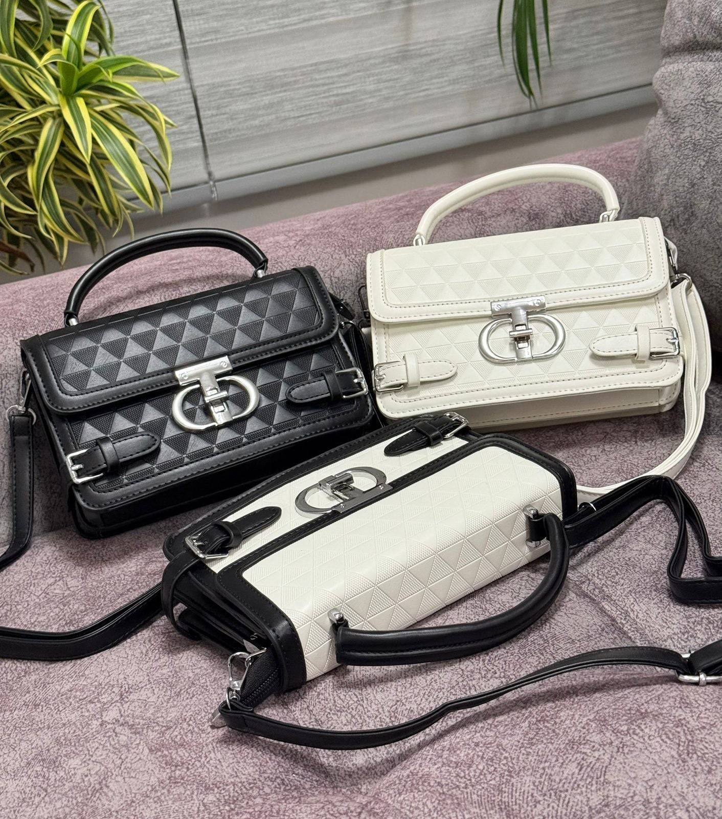 Cartera Iconica