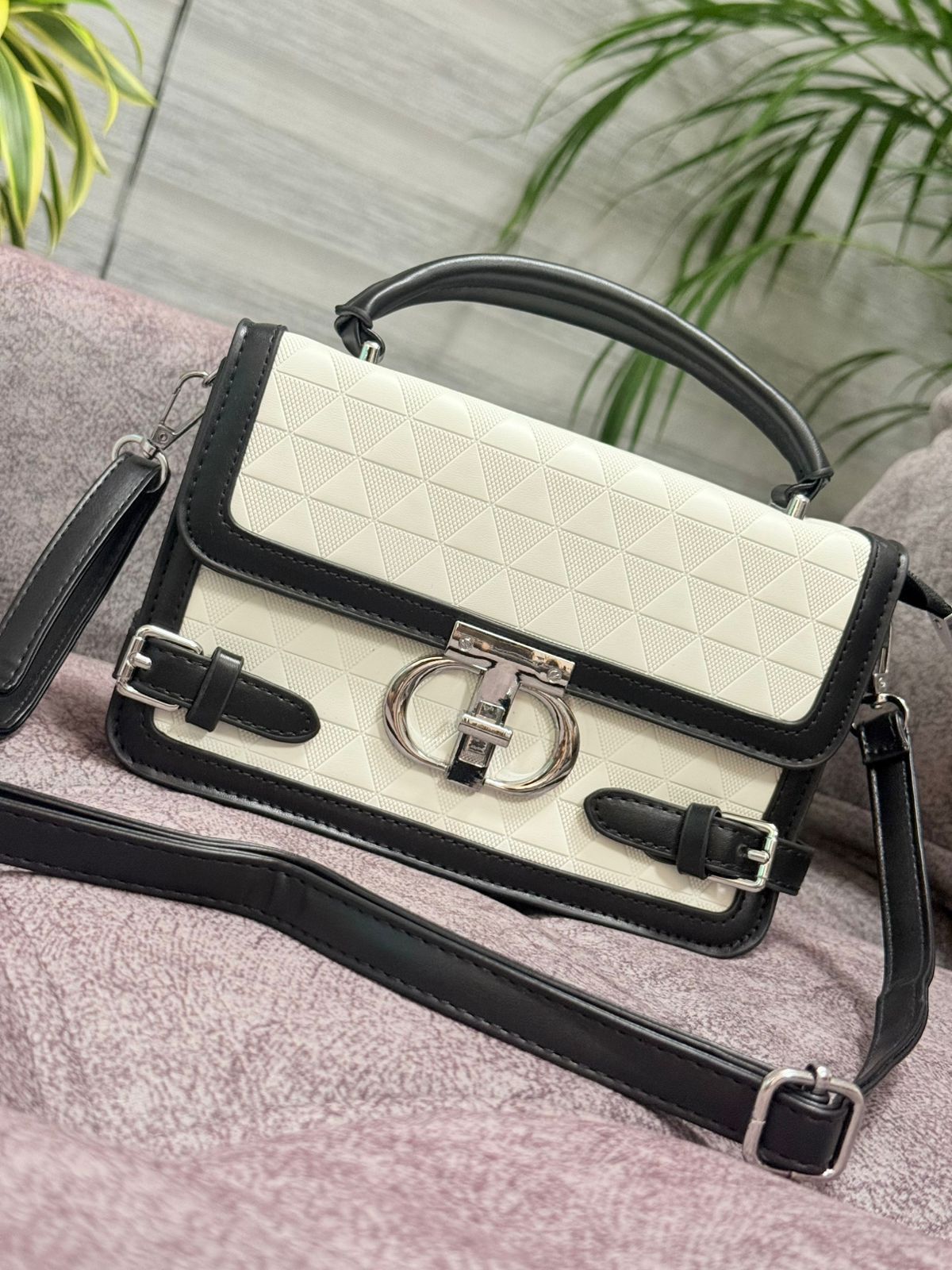 Cartera Iconica
