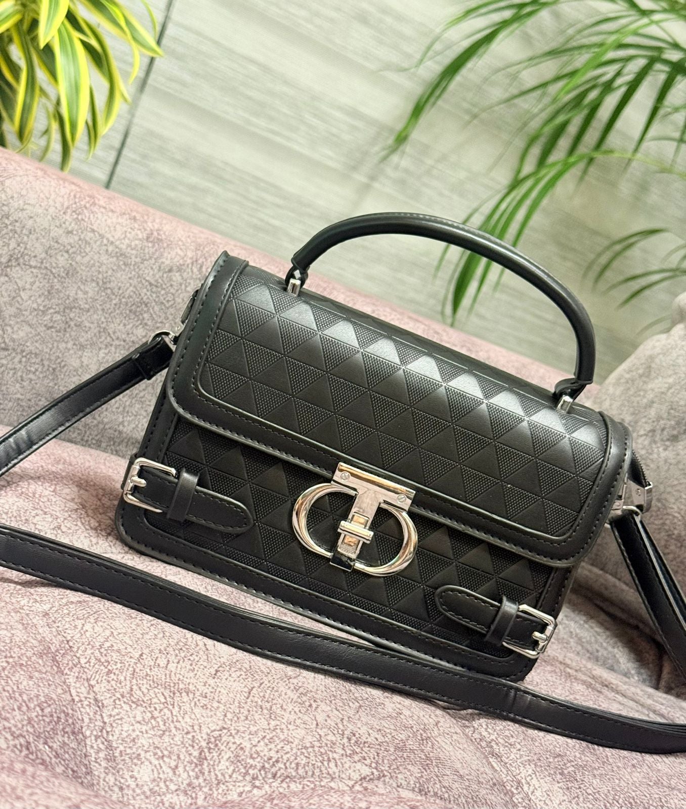 Cartera Iconica